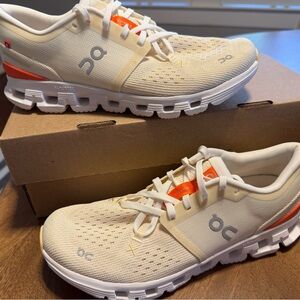 On Running Beige and Orange Athletic Shoes